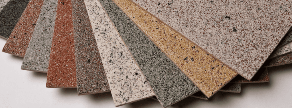 Color palette of StoCreativ Granite samples, displaying a variety of textures and colors for design versatility.